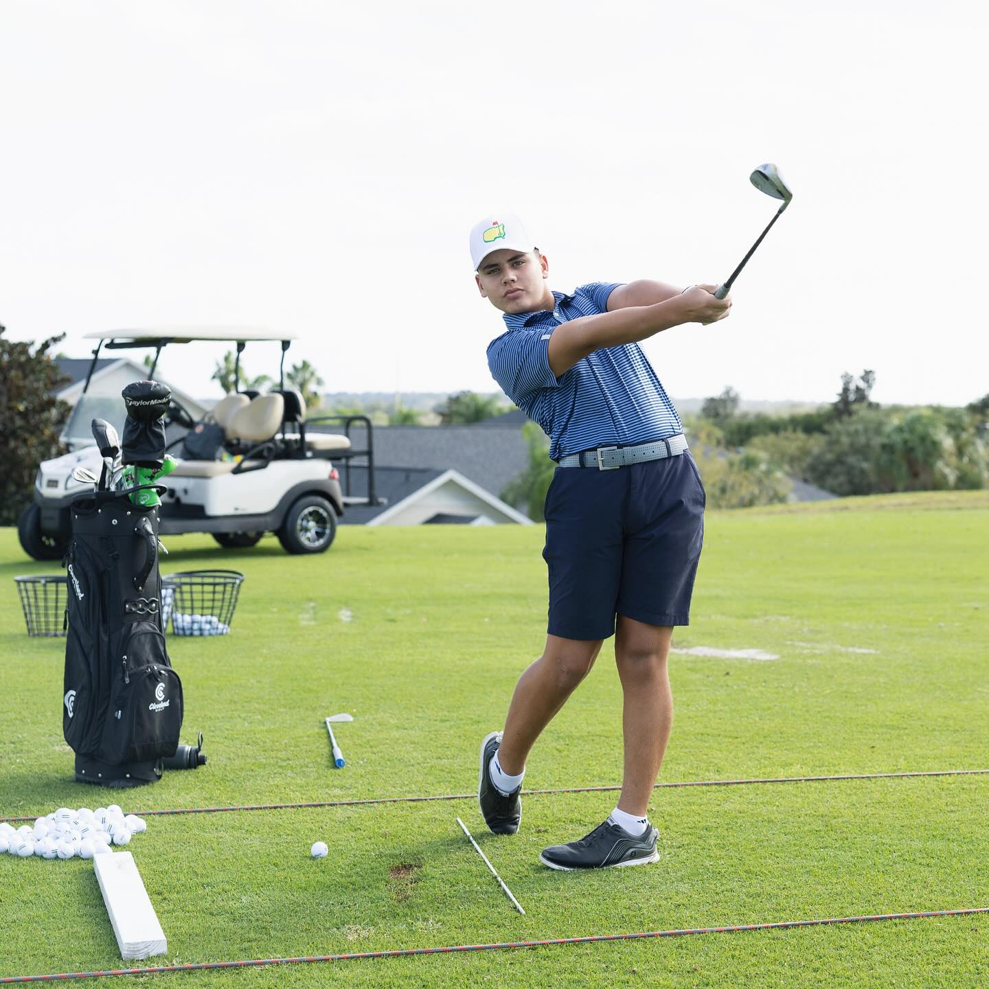 golfer taking a swing